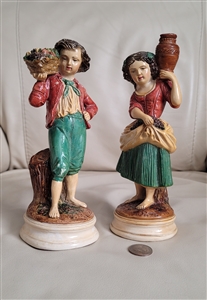 Vintage Borghese chalkware boy and girl harvest figurines featuring hand painted details