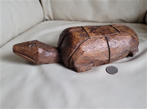 Antique 1890s primitive hand carved solid wood turtle sculpture featuring adze tool facets, scored shell scutes, snake head snout, and aged tobacco patina