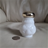 Preowned vintage Avon Moonwind milk glass powder sachet bottle with gold-tone cap