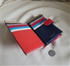 Authentic Vera Pelle red leather double fold wallet featuring a vibrant multicolored rainbow interior with multiple card slots and an ID window