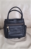 2000s Fossil black leather vintage satchel handbag featuring dual top handles, front zip pocket, and signature key charm