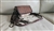 Myra Bag crossbody with woven pink and ivory geometric pattern genuine leather flap and long side leather fringe