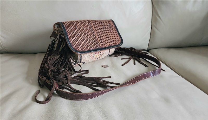 Myra Bag crossbody with woven pink and ivory geometric pattern genuine leather flap and long side leather fringe