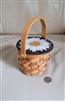 Harold Feinstein daisy painting on a small woven basket lid with artist sign on the lid