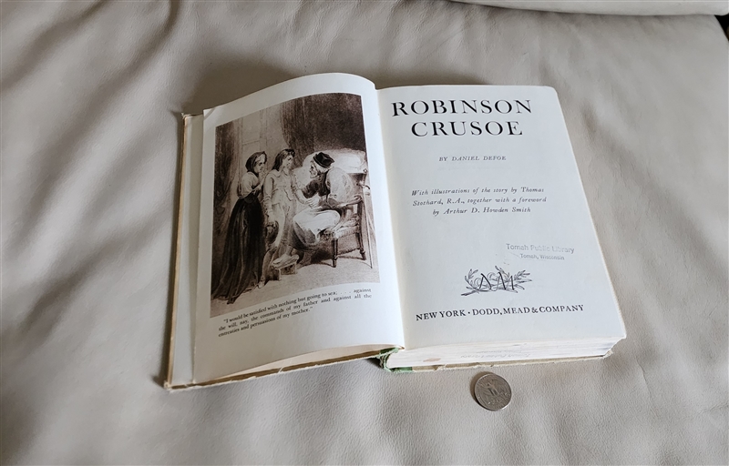 Vintage 1946 Robinson Crusoe hardcover book by Daniel Defoe with 425 plus pages library book wear