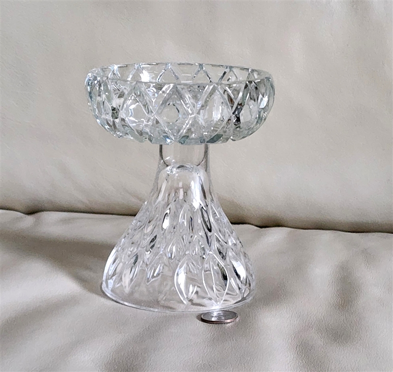 This image showcases the dual design of the hand joined thicker glass structure highlighting the transition between the sharp geometric patterns and the soft teardrop base
