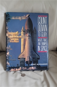 Illustrated dust jacket on a preowned vintage NASA space exploration history book