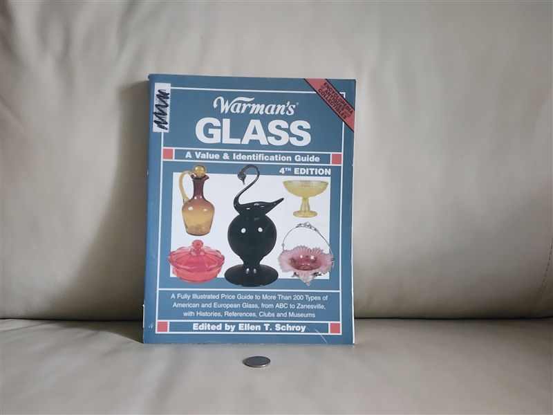 Preowned vintage 2002 Warmans Glass 4th Edition value and identification guide book front cover on neutral background