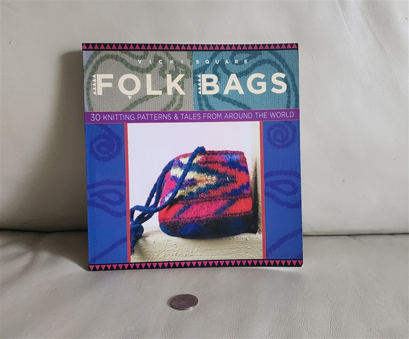 Crafting patterns book Folk Bags 30 knitting patterns by Vicki Square showing a colorful knitted bag