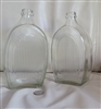 Hand blown clear glass bottles with ribbed side collectible display