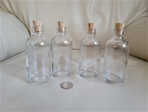 Set of 4 glass storage display glass bottles