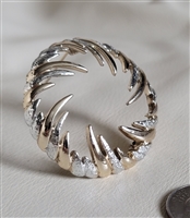 Vintage Sarah Coventry two tone gold and silver swirl brooch front view