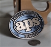 American Protective Services  APS belt buckle in black and gold colors with large emblem