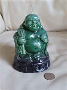 Vintage Buddha wax candle in jade green color on black base
