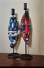 Set of 2 hand painted 16 inch wood tribal mask candle holders on black metal stands