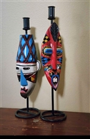 Set of 2 hand painted 16 inch wood tribal mask candle holders on black metal stands