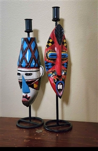 Set of 2 hand painted 16 inch wood tribal mask candle holders on black metal stands