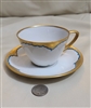 Preowned vintage fine porcelain teacup and saucer set with blue and gold accents
