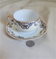 Antique Haviland Limoges porcelain teacup and saucer set with cobalt blue scroll pattern