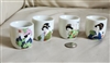 Vintage Japanese ceramic Sake drinking cups with Geisha decor, set of 4.