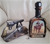 Vintage empty 750 ml Jim Beam Remington the Cowboy porcelain bottle with modern resin revolver letter stand
