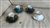 Set of six vintage porcelain multicolor teacups and saucers in black white navy blue and emerald green with gold geometrical pattern