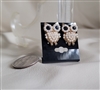 Vintage gold tone metal owl stud earrings featuring faux pearl beads bodies and black eye accents