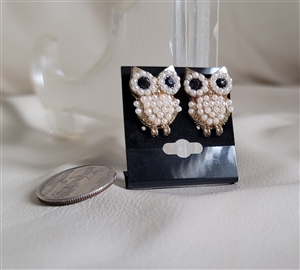 Vintage gold tone metal owl stud earrings featuring faux pearl beads bodies and black eye accents