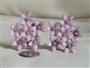 Vintage large floral clip-on earrings set with fuchsia color.
