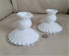 Pair of vintage Fenton Spanish Lace milk glass candle holders with clear ruffled edges and partial label