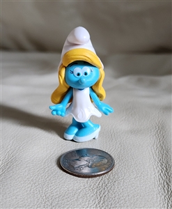 Front view of Schleich Smurfs 2011 Smurfette miniature toy with blonde hair and white dress