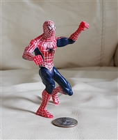 Preowned unbranded red and blue kneeling Spiderman plastic action figure toy with articulated limbs