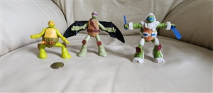 TMNT Teenage Mutant Ninja Turtles 3-piece set of 2016 McDonald's Happy Meal action figures featuring Leonardo, Donatello, and Michelangelo