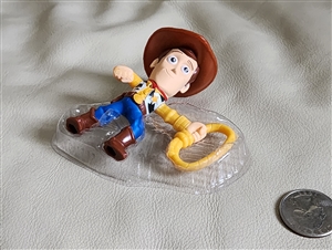 Front view of Toy Story Woody Cowboy 2019 McDonalds Happy Meal toy 3" toy with lasso rope