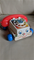 1961 Fisher Price Chatter Pull Along Rotary Phone in multicolor toy