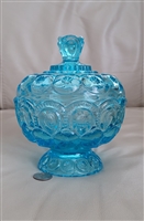 Vivid blue vintage L.E. Smith Moon and Stars lidded pedestal candy dish with embossed pattern, Side view of lidded blue glass candy dish on pedestal base showing vintage wear and patina, Close up of the faceted glass lid finial and moon and star pattern o