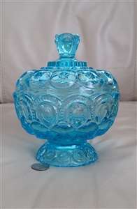 Vivid blue vintage L.E. Smith Moon and Stars lidded pedestal candy dish with embossed pattern, Side view of lidded blue glass candy dish on pedestal base showing vintage wear and patina, Close up of the faceted glass lid finial and moon and star pattern o