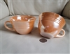 Set of two preowned vintage Anchor Hocking Peach Lustre Three Bands glass teacups