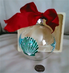 1980s clear glass ornament with blue hand painted seashells and red bow, hanging ornament