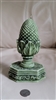 Green candle sconce shaped finial wax candle by LAVA Enterprise.