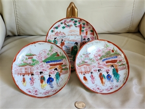 Set of 3 vintage Japanese porcelain Moriage plates depicting Geisha figures with red Shimizu backstamp on base multicolor design