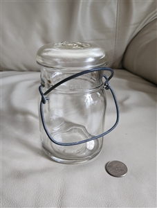 Vintage Hazel Atlas glass storage jar with wire bail closure and glass lid