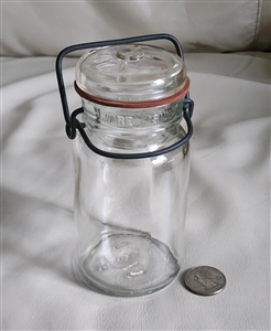 Vintage glass storage jar with wire bail closure, glass lid, and rubber seal