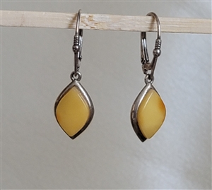pair of preowned vintage 1990s butterscotch baltic amber marquise cabochon sterling silver dangle earrings with lever-back clasps
