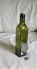 Vintage hunter green glass storage bottle with paneled sides and cork stopper