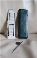 Vintage 1964 Omega pocket slide adding machine with stylus pointer, vinyl sleeve, and original box