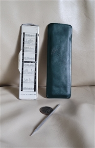 Vintage 1964 Omega pocket slide adding machine with stylus pointer, vinyl sleeve, and original box