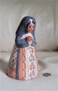 Mexican Barro Bruñido Tonala pottery praying woman figure featuring hand painted bird and floral motifs
