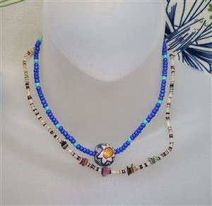 Vintage 2000s handmade choker set showing shell fragment strand on nylon line and blue beaded strand with floral painted wooden bead