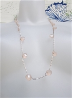 Vintage Banana Republic long necklace with faceted pale pink elements and BR tag